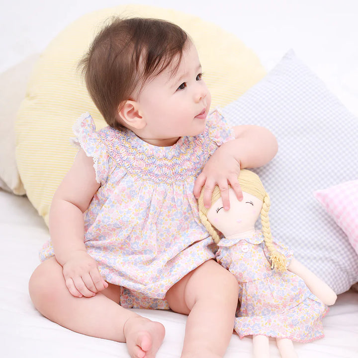 Jeanne Hand Smocked Raglan Romper